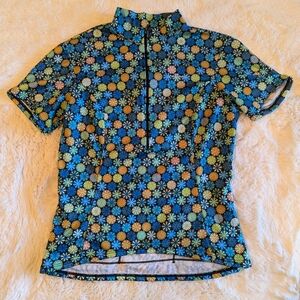 Shebeest Womens Cycling Shirt 1/2 Zip Short Sleeve Geometric/floral sz.M